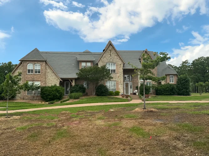 Two-story stone and brick custom home in Nocona, Texas